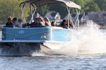 a group of people riding on a boat