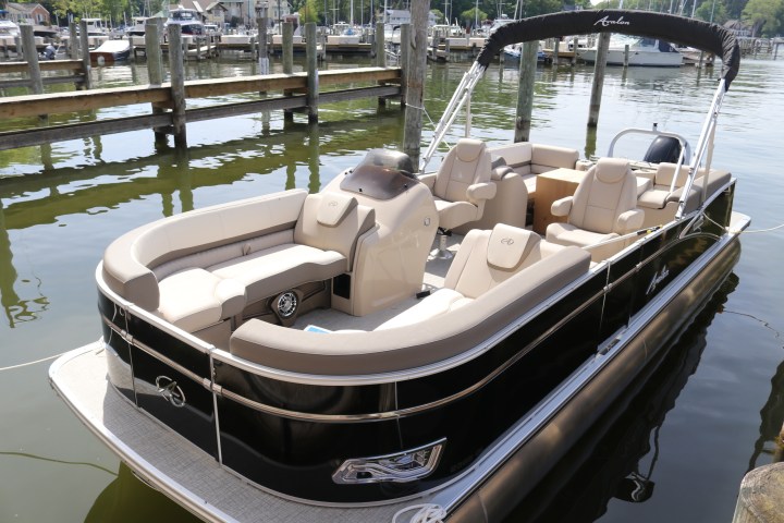 a boat is docked next to a body of water